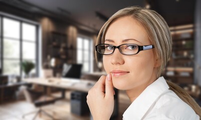 Portrait of confident businesswoman on office background.