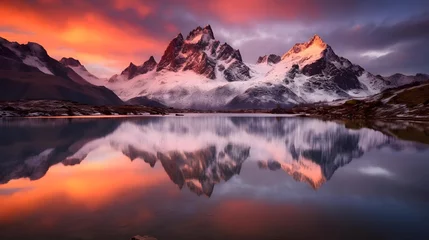 Fototapete Rund Panoramic view of snowcapped mountain peaks reflected in lake at sunset © Iman