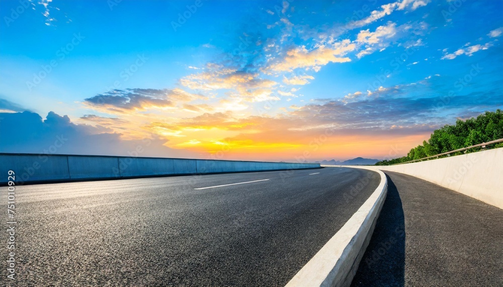 Wall mural asphalt highway and beautiful clouds landscape at sunset