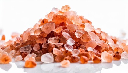 closeup of himalayan pink rock salt isolated over white background - obrazy, fototapety, plakaty