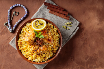 Spiced Chicken Biryani in Clay Bowl for Ramadan Iftar, Copy Space, Top view