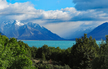 Naklejka na ściany i meble New Zealand Essence: Nature's Palette. Discover New Zealand's allure in these captivating photos. From Southern Alps to Maori traditions, embrace the beauty and culture in every frame.