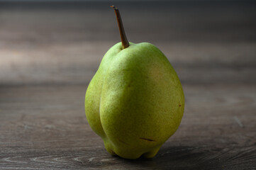 juicy pear on a wooden table 3