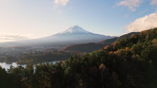 aerial view drone of the forest in the fall with mount fuji and lake kawaguchi in the background