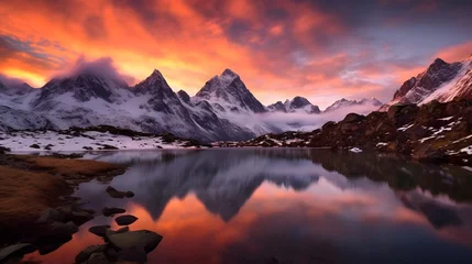  Panoramic view of snowy mountains reflected in lake at sunset. © Iman