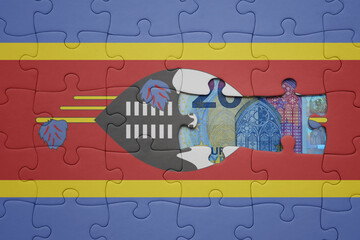 puzzle with the national flag of eswatini and euro banknote. finance concept
