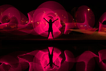 Woman silhouettes with light painting