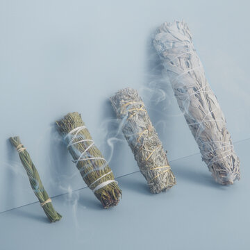 Self Care Sweetgrass, Sage, white sage and smoke on blue