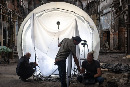 Lighting assistants work on horror films