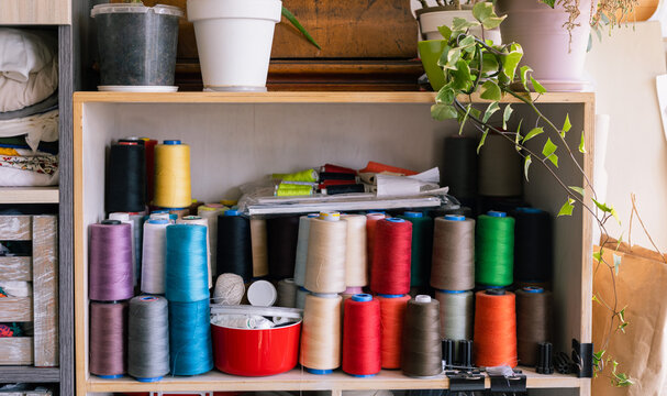 shelf with skeins of thread