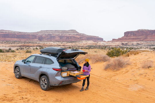 Woman Standing With Car Camper