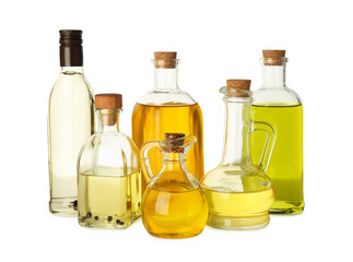 Vegetable fats. Glassware of different cooking oils isolated on white