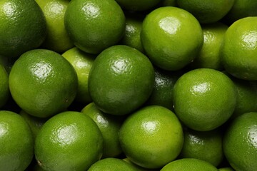 Many fresh ripe limes as background, top view