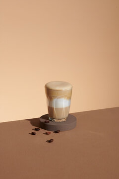 coffee latte on brown table with copy space for your text