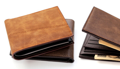 Brown wallets on white background.