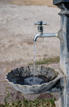 water flowing from the faucet