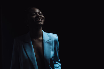 a bright girl on a dark background 