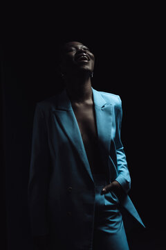 a bright girl on a dark background 