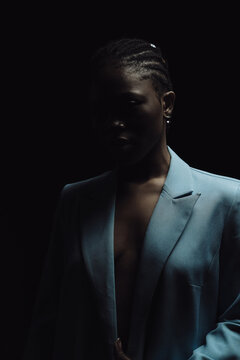 a bright girl on a dark background 