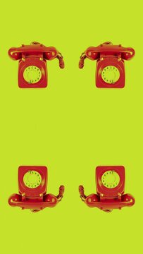 red vintage telephone in vertical