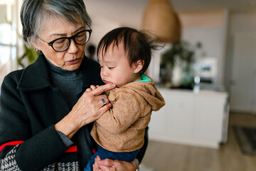 Grandma comforts baby