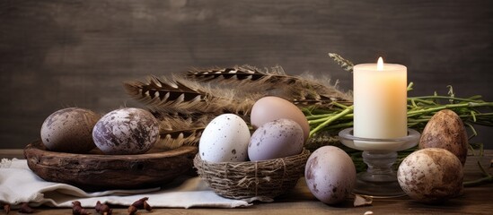 Fototapeta na wymiar A rustic still life arrangement featuring a candle, natural eggs, and feathers placed on a wooden table. The simple and stylish decoration creates a warm and inviting atmosphere.