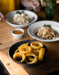 a lunch of pasta and calamari fritters