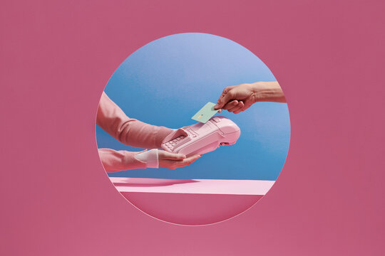 Contactless payment, paypass. Hand hold bank card near terminal