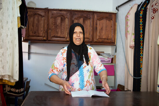Portrait of a women in her fifties in her local design shop