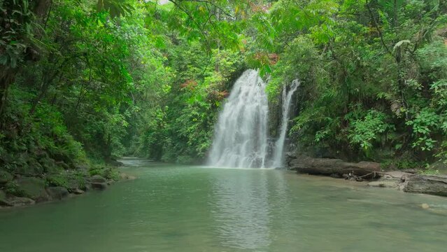 A waterfall hidden deep in a tropical forest of Indonesia