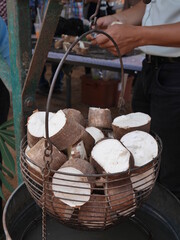 Fresh cassava roots in a basket