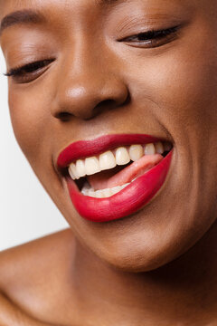 Woman biting her tongue