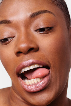 Woman sticking out her tongue