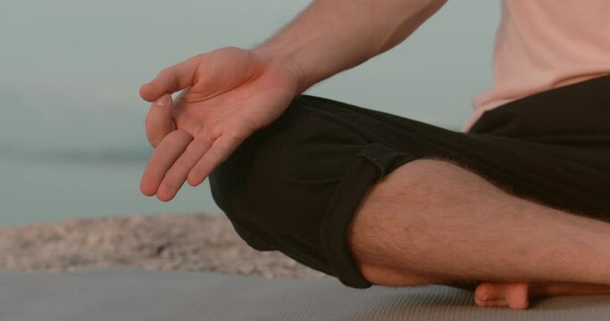 Beach evening sunset enlightened person meditating gesture mudra front view. Mudra bridging yoga and awakening Yoga exercises harmonizing with summer Mudra gesture journey to self Embracing peace.