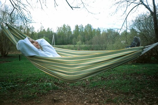 Young woman in a hammock