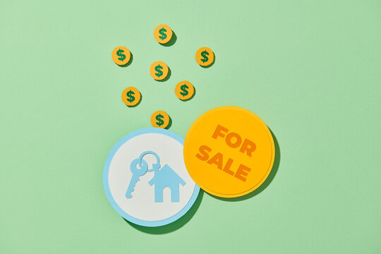 Hand with paper money and house shape. new house buy concept