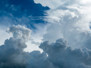 Blue sky fluffy white clouds on summer season bright clear skyline with beautiful cloudscape. Panorama blue sky clouds pattern on daylight with copy space. Cumulus cloudscape air climate sunny day © aFotostock
