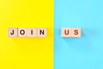 Join Us job invitation announcement in wooden blocks typography. Recruitment and job hiring concept.