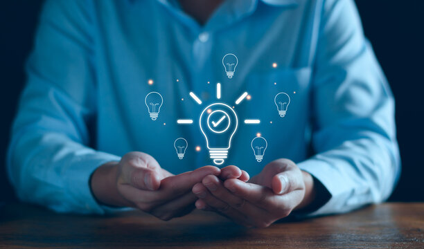 Business solution idea concept. Businessman  creative light bulbs with marketing network, planning strategy, analysis solution and development, modern business technology, Innovative of new idea.