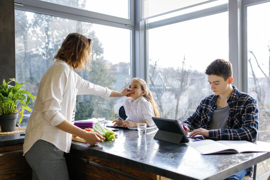 Parent cooking schooling leisure activity pursuit kitchen 
