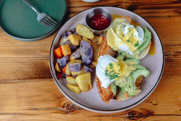 A plate of food with a fork and knife on a table