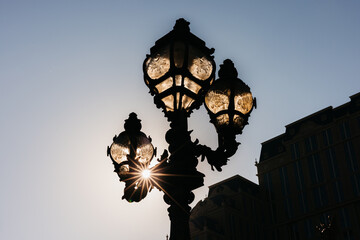 Silhouette of Ornate Street Lamps