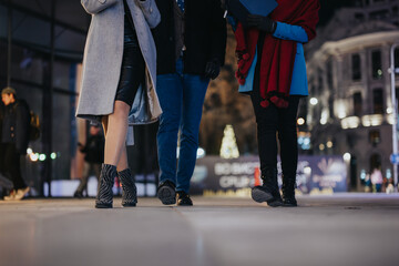 A group of friends bonding as they walk on a city street at night, with festive lights in the background, capturing the essence of friendship and urban life.
