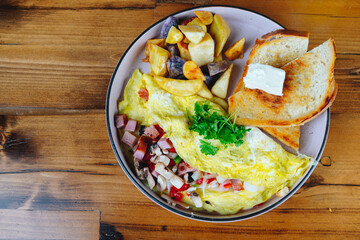 A plate of food with a piece of toast on the side