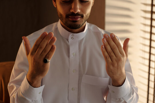 Religious Young Man Praying