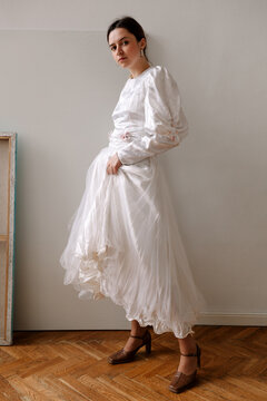 Elegant woman in white dress