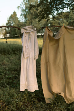evening dress and fabric hanging on a string