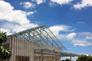 Obraz premium new house roof beams steel structure construction site