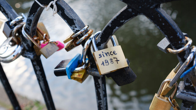 Love Padlocks on handrail by canal in London