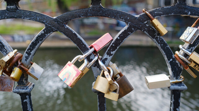 Love Padlocks on handrail by canal in London